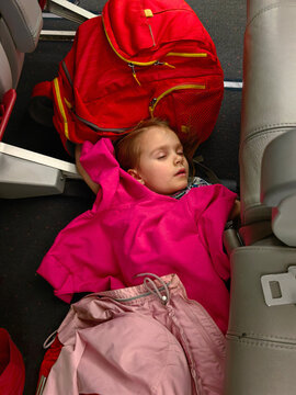 Naklejki kid sleeping in airplane 