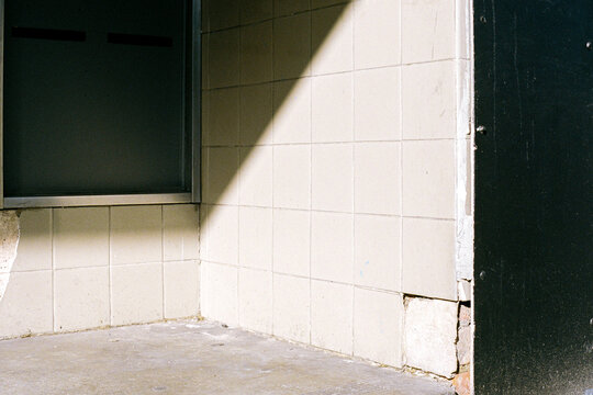 Film photo of Sunlit Corner with Subtle Textures and Shadows