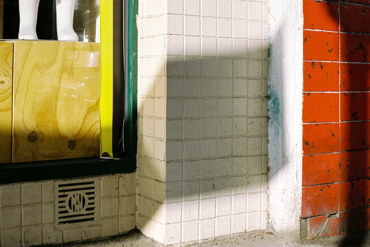 Fototapeta Colorful tiled wall and window with unique shape