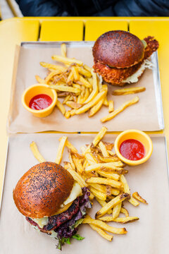 Two fast food burgers menu on table