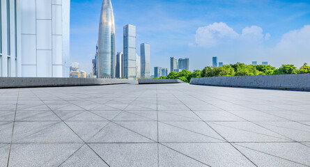 Empty square floor and city skyline with modern buildings in Shenzhen, China.