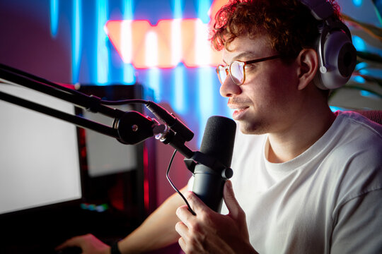 Closeup of a man talking on mic
