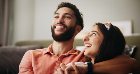 Hug, happy couple and comedy in living room with smile, bonding and weekend date in apartment....