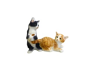 Two Adorable Cat Figurines Interacting Playfully