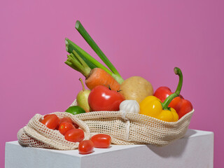 A collection of fresh vegetables, including tomatoes, carrots