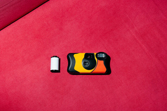 Disposable camera with film roll