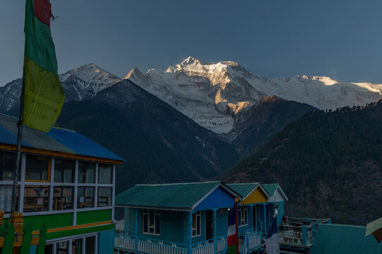 Peak of Annapurna II from between the teahouses in Upper Pisang.