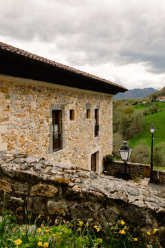 Stone structure standing at the border of a rural area in Asturias