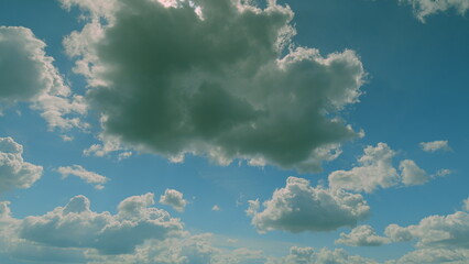 A Beautiful and Majestic Cloudy Sky where Radiant Sunlight Shines Through the Clouds Time lapse.