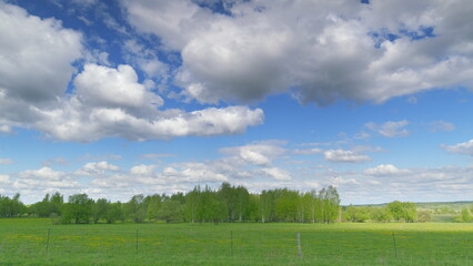 The Lush Green Landscape Under Dramatic, Beautiful Skies is Truly Mesmerizing and Captivating Time lapse.