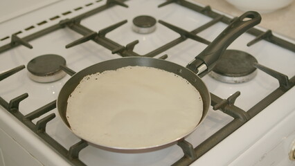 Cooking Delicious Pancakes Using a Gas Stove That Makes Breakfast or Brunch Extra Special