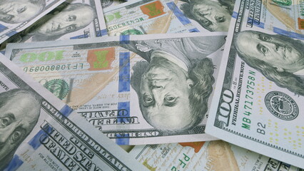Stacks of U.S. Dollar Bills A Detailed CloseUp of Currency in Various Contexts
