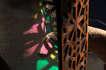 Beautiful stained glass patterns on a wooden surface