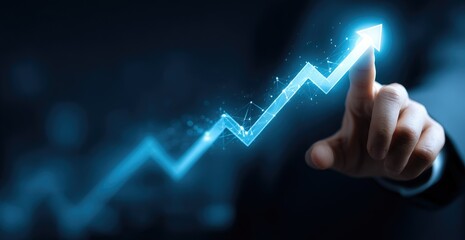 Hand points to a glowing upward trend