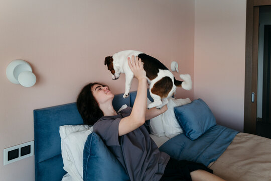 Joyful Moment Shared Between a Person and a Dog