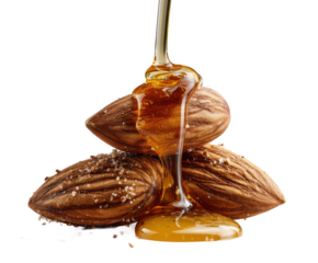 Drizzling honey over roasted almonds kitchen food bright lighting isolated on transparent background