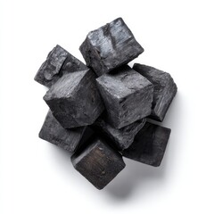 Dark, square charcoal blocks clustered
