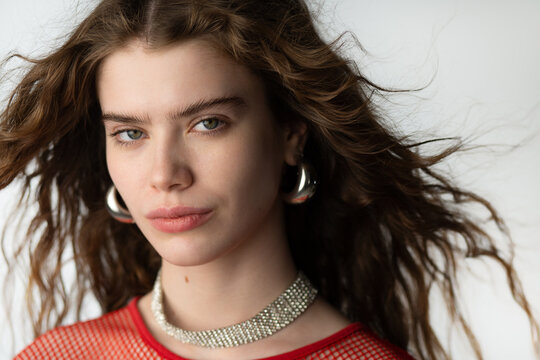 Curly haired model looking at camera
