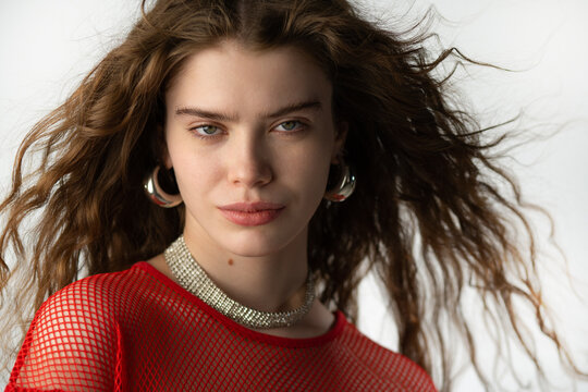 Curly haired model looking at camera