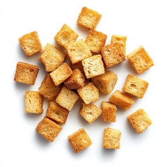 Golden crispy croutons scattered on a clean white background for culinary and food related imagery