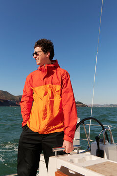 Man on yacht cruise 