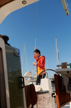 Man on yacht cruise 
