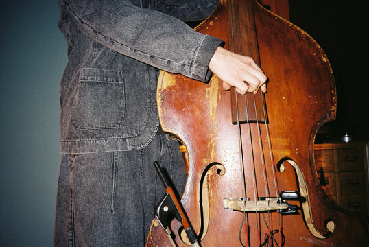 Playing Double Bass Close-Up with Vintage Look
