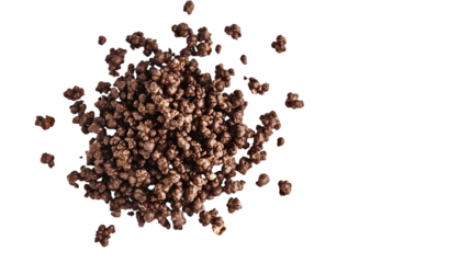 A top down view of a pile of chocolate covered cereal puffs on the left side isolated on transparent background