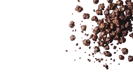 A heap of chocolate covered popcorn pieces scattered in a setting isolated on transparent background