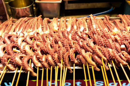 Fresh octopus tentacles on skewers