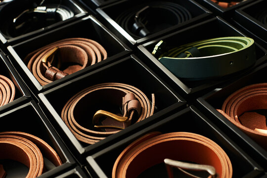 Photo of belts in boxes 