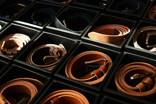 Photo of belts in boxes 