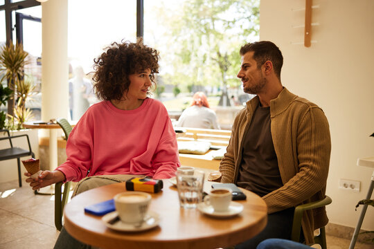 Man and woman on a date at a candy store