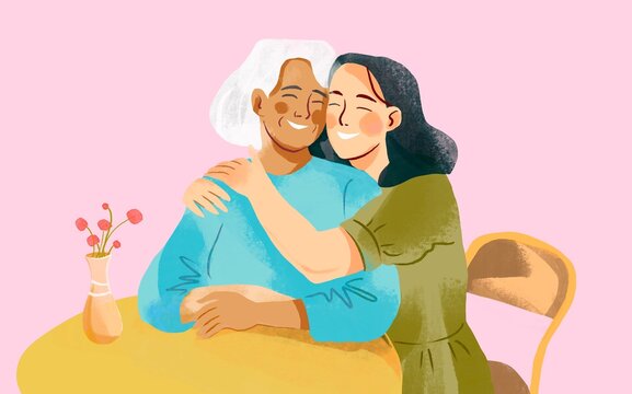 Two woman hugs 