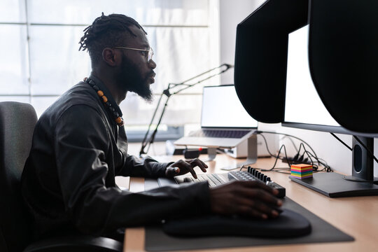 Video editor working from home using professional computer