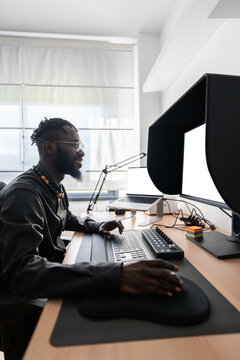 Video editor working from home office using professional