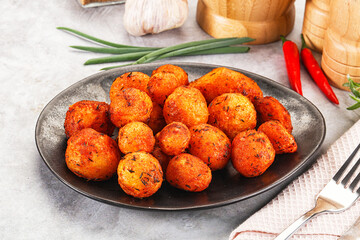 Baked young potato with paprika