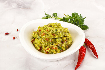 Guacamole with avocado, tomato and chili