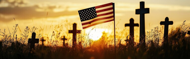 Sunset silhouette of crosses and american flag - remembrance and memorial day tribute
