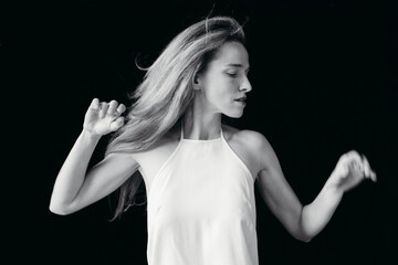 Elegant Dancer Expresses Emotion Through Fluid Movement in Monochrome