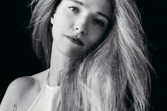 Portrait of Elegance Captured in Black and White Light and Shadow