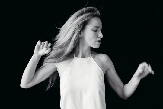 Elegant Dancer Expresses Emotion Through Fluid Movement in Monochrome