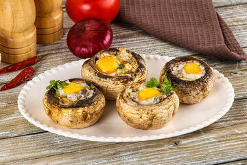 Baked champignon with quail egg