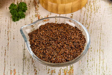 Brown flax seeds in the bowl