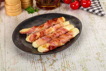 Hot mozzarella sticks with bacon