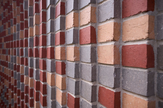 Fototapeta Close Up of Textured Brick Wall with Alternating Pattern in Fitzroy