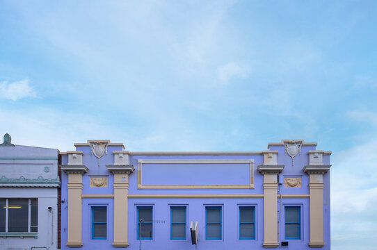 Lavender Building with Ornate Details in Fitzroy