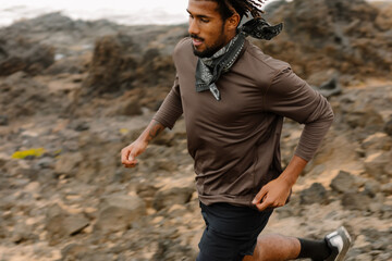 Sports shot showing motion blur of a trail runner in action