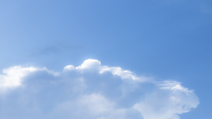 White Cumulus Clouds in a Blue Sky