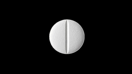 Single white round pill with a center groove